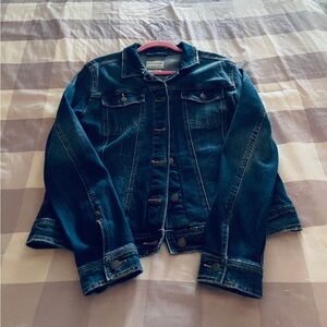 Womens medium to dark blue denim jacket.